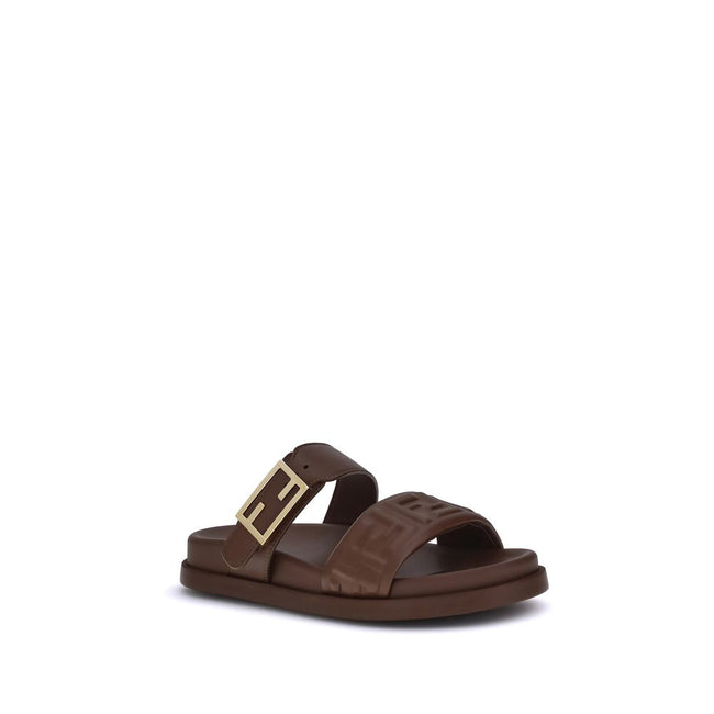 Brown Calf Leather Bos Taurus Flat SandalsLeather Sandals with FF detail by Fendi, a perfect combination of iconic style and everyday comfort. The design is defined by a double front band embellished with the embossed FF motif, the unmistakable symbol of