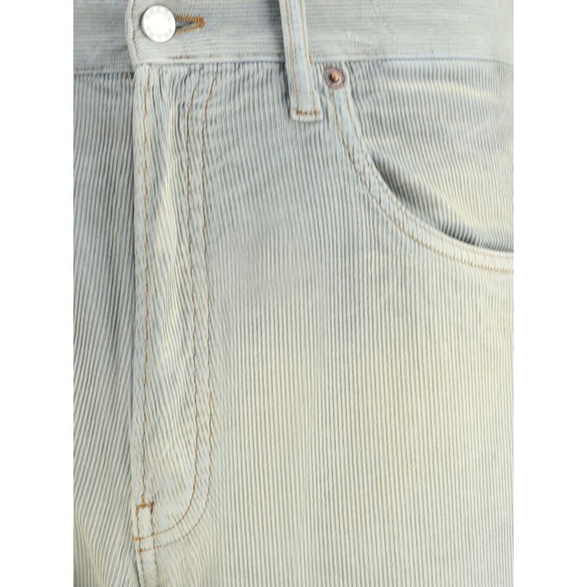 Light Blue Cotton Casual PantsFive-pocket Pants in cotton with a corduroy effect by Prada. The model features a front button fastening, belt loops at the waist and a logo patch applied on the back. The faded finish design gives the garment a lived-in and