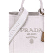 Cream Cotton Shoulder BagPrada’s extra large Jardinière Handbag combines elegance and functionality in a high-quality linen blend. Featuring two tubular handles and exposed topstitching, it has an adjustable and removable ribbon shoulder strap for differe