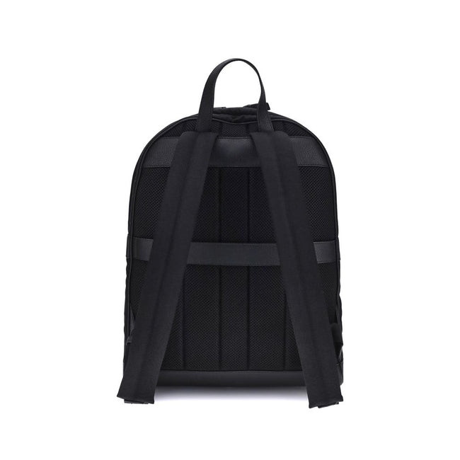 Black Nylon BackpackThe Ferragamo nylon Backpack combines functionality and style in a modern and refined design. Featuring a top zip closure and adjustable shoulder straps, it ensures practicality and comfort. The signature print on the front adds an ico
