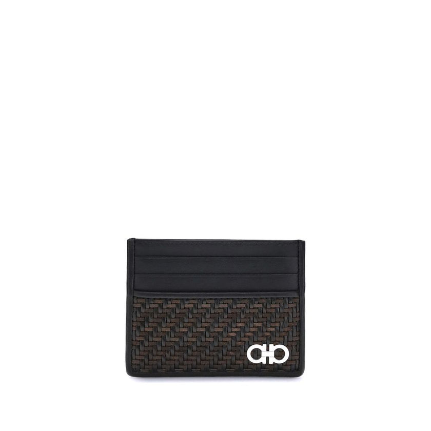 Black Calf Leather Bos Taurus WalletThe Ferragamo Gancini Card Holder combines elegance and craftsmanship in a compact and refined format. Featuring slots on both sides for practical organization, it is embellished with a palladium-finish Gancini ornament