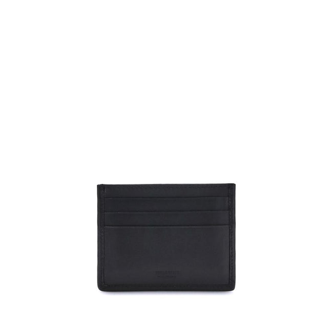 Black Calf Leather Bos Taurus WalletThe Ferragamo Gancini Card Holder combines elegance and craftsmanship in a compact and refined format. Featuring slots on both sides for practical organization, it is embellished with a palladium-finish Gancini ornament