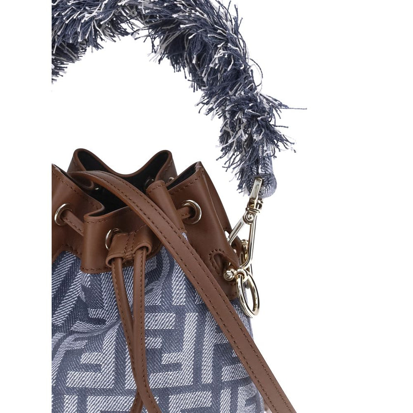 Light Blue Cotton Shoulder BagThe Mon Tresor Bucket Bag by Fendi is made of denim-effect FF jacquard in shades of blue, with brown calfskin details that enhance its elegance. The interior is lined and enriched with gold-finish metal accessories. The handl