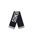 Fringes wool ScarfThe Jacquemus Wool Scarf is an essential accessory with a modern and minimal style. Made of solid-colored yarn, it is embellished with a contrasting jacquard logo, which gives character without sacrificing sobriety. The design is complet