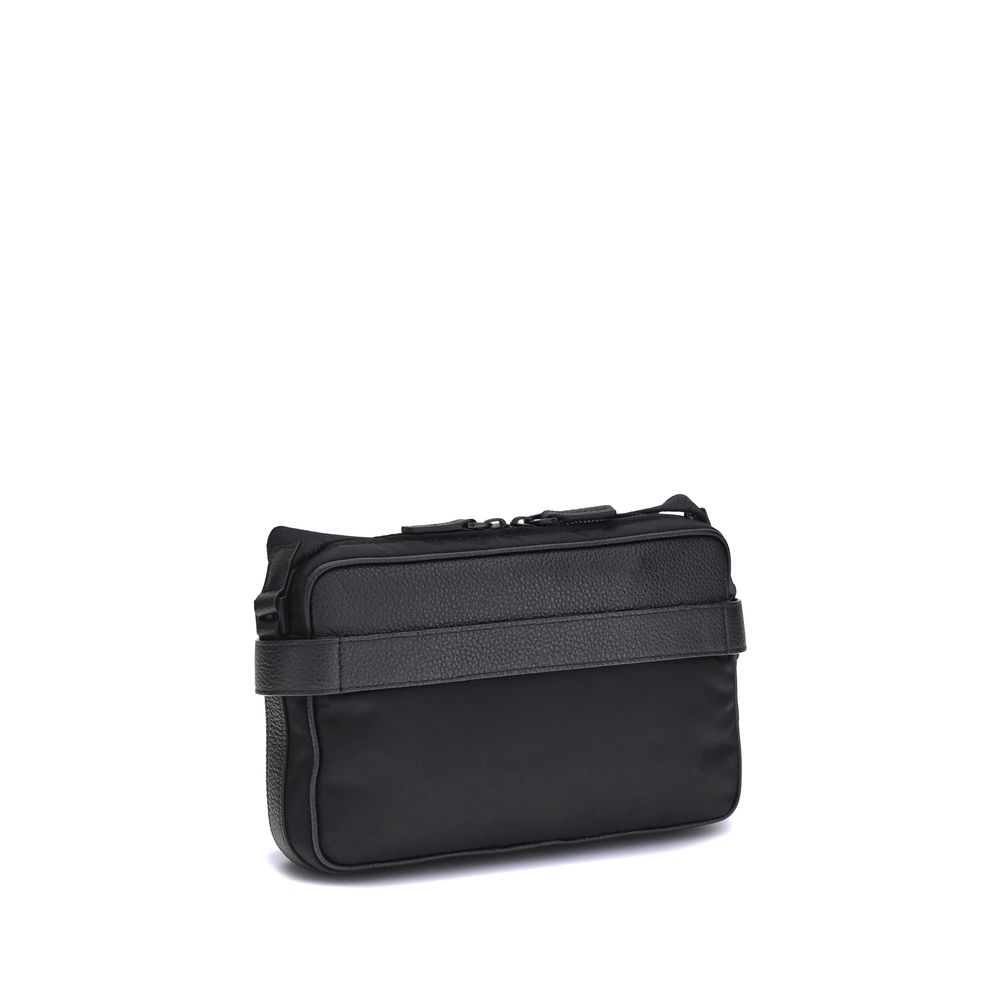 Black Calf Leather Bos Taurus Shoulder BagThe Ferragamo Gancini buckle Shoulder Bag combines style and functionality with a mix of technical fabric and hammered leather. The roomy interior with zip and a back pocket make it practical, while the patent-fin