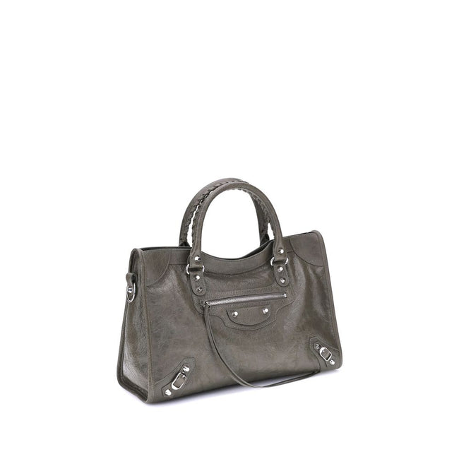 Green Calf Leather Bos Taurus Shoulder BagThe Balenciaga Le City medium Shoulder Bag is a premium piece crafted from premium lambskin that combines elegance and functionality. Two hand-woven leather handles add a refined, artisanal touch, while the adjust