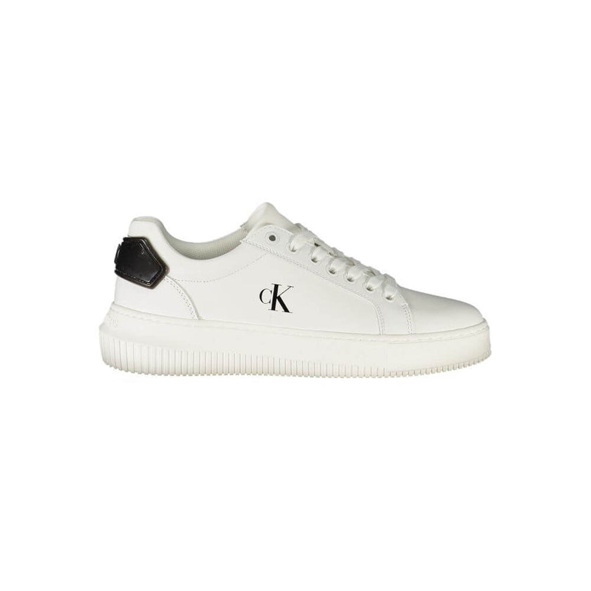 White Leather Women SneakerStep into the realm of sleek sophistication with Calvin Klein’s latest rendition of urban elegance. These sports shoes, with their crisp white demeanor accented by bold black contrasts, are more than just footwear; they’re a sta