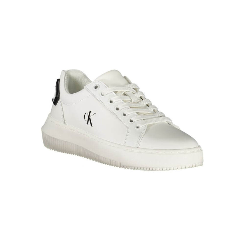 White Leather Women SneakerStep into the realm of sleek sophistication with Calvin Klein’s latest rendition of urban elegance. These sports shoes, with their crisp white demeanor accented by bold black contrasts, are more than just footwear; they’re a sta