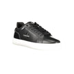Black Leather Men SneakerStep up your game with the Calvin Klein sports shoe, where function meets fashion in a dynamic fusion. Featuring a sleek black design punctuated by bold, contrasting white details, these sneakers boast both style and substance. Th