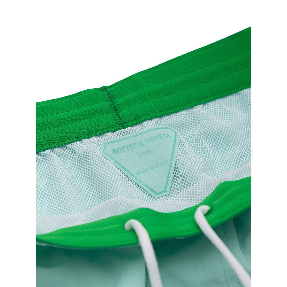 Turquoise Polyamide Swim ShortsTurquoise Nylon Boxer Costume Bottega Veneta. Elastic waist with adjustable drawstring, two side pockets, internal mesh, medium length. Composition: 100% Polyamide Internal SKU: 25GIU54 Brand SKU: 729760V2Q104159Turquoise Po