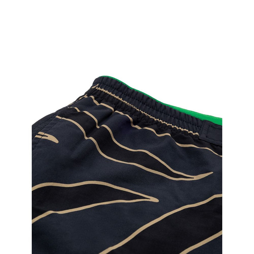 Blue Polyamide Swim ShortsAnimal Print Boxer Costume Bottega Veneta. Elastic waist, visible metal button closure, two side pockets, internal mesh. Composition: 100% Polyamide Internal SKU: 25GIU56 Brand SKU: 729185V37M04004Blue Polyamide Swim Shorts${tags