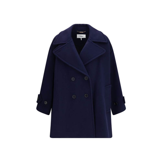 Blue Wool CoatThe Chloé oversized double breasted Wool Coat is a sleek, structured piece for the cold season. Featuring wide lapels and a collar strap, it is finished with engraved horn buttons at the collar, front and cuffs. Side pockets and a knee-lengt