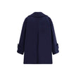 Blue Wool CoatThe Chloé oversized double breasted Wool Coat is a sleek, structured piece for the cold season. Featuring wide lapels and a collar strap, it is finished with engraved horn buttons at the collar, front and cuffs. Side pockets and a knee-lengt