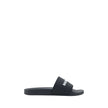 Black Rubber Flat SandalsBalenciaga’s Rubber Pool Sandals are a slip-on style with a minimal and contemporary style. Featuring a flat sole for maximum comfort, they feature the brand’s iconic contrasting signature on the front strap, which adds a distinct