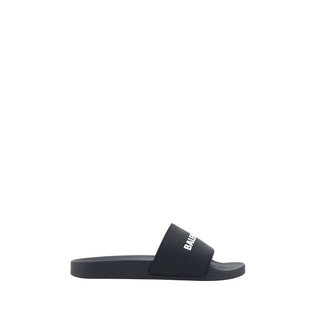 Black Rubber Flat SandalsBalenciaga’s Rubber Pool Sandals are a slip-on style with a minimal and contemporary style. Featuring a flat sole for maximum comfort, they feature the brand’s iconic contrasting signature on the front strap, which adds a distinct