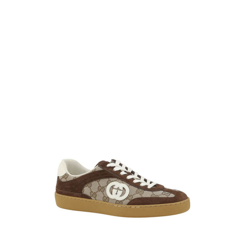 Brown Calf Leather Bos Taurus Low Top SneakersGucci’s Sneakers feature suede details that add a touch of elegance and softness to the design. The iconic GG fabric is repeated all-over, giving a distinctive and recognizable look. The front lace-up closure