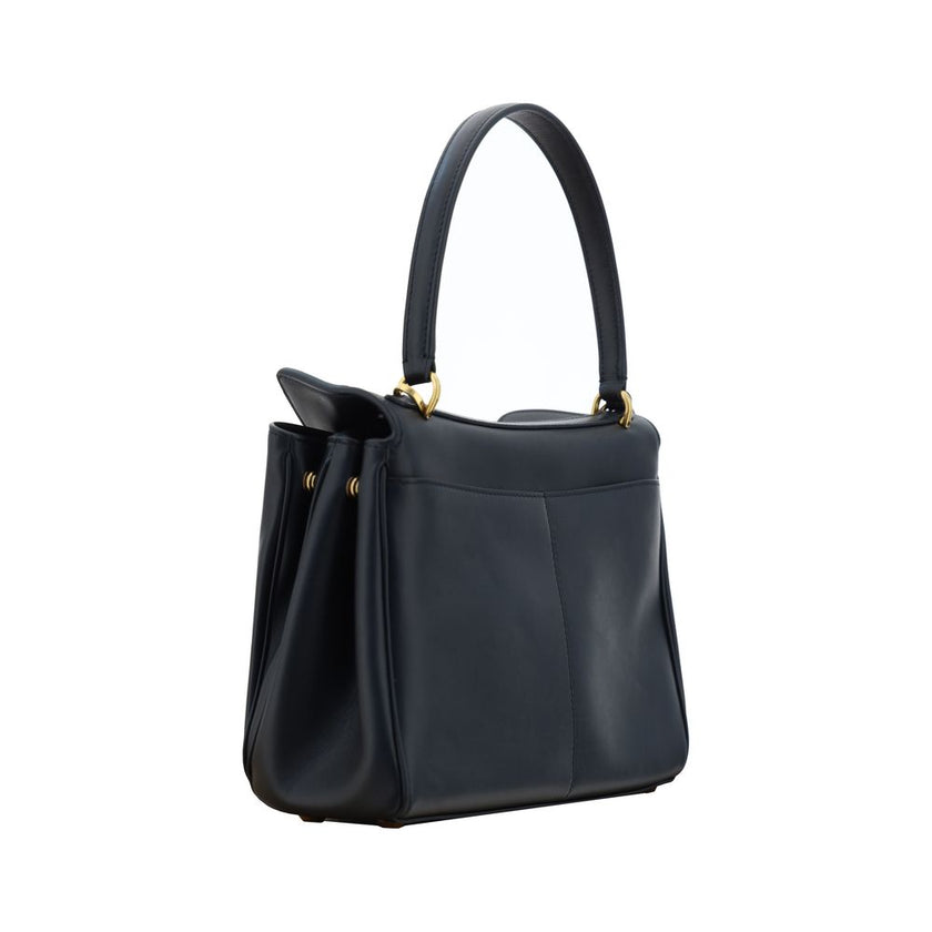 Black Calf Leather Bos Taurus Shoulder BagBalenciaga’s signature leather Rodeo Shoulder Bag is a sophisticated and versatile accessory. The flat handle at the top offers a comfortable grip, while the removable shoulder strap allows you to adapt it to your