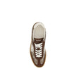Brown Calf Leather Bos Taurus Low Top SneakersGucci’s Sneakers feature suede details that add a touch of elegance and softness to the design. The iconic GG fabric is repeated all-over, giving a distinctive and recognizable look. The front lace-up closure
