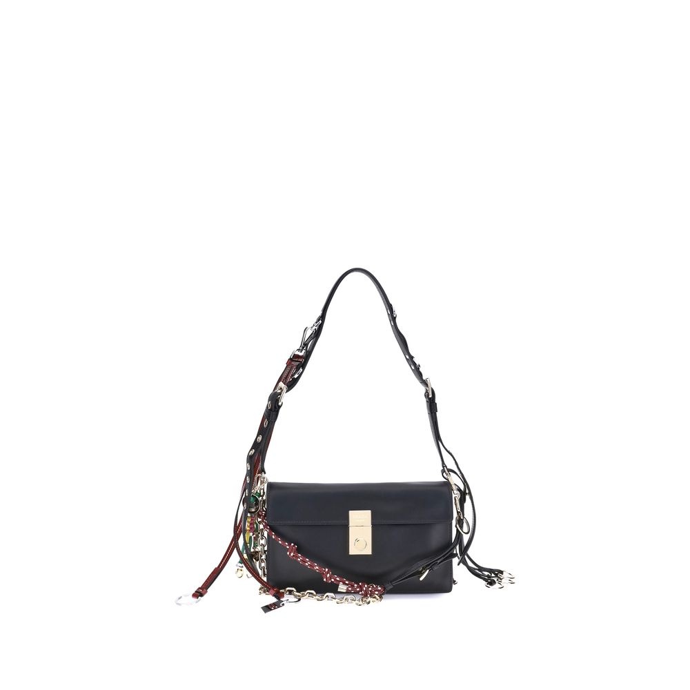 Black Calf Leather Bos Taurus Shoulder BagPrada’s Soft Sound Small Shoulder Bag combines soft lines and refined details in a compact and functional design. Made of lightly grained leather, it is embellished with a metallic logo detail on the front and rem