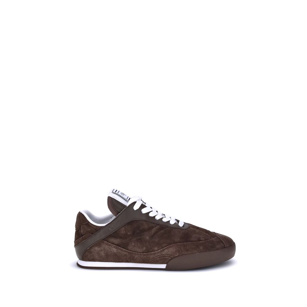 Brown Calf Leather Bos Taurus Low Top SneakersThe Kick Suede Sneakers by Chloé combine style and comfort. They feature a round toe and a paneled design that creates a dynamic visual effect. Suede details add a refined texture, while the front lace-up clos