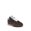 Brown Calf Leather Bos Taurus Low Top SneakersThe Kick Suede Sneakers by Chloé combine style and comfort. They feature a round toe and a paneled design that creates a dynamic visual effect. Suede details add a refined texture, while the front lace-up clos