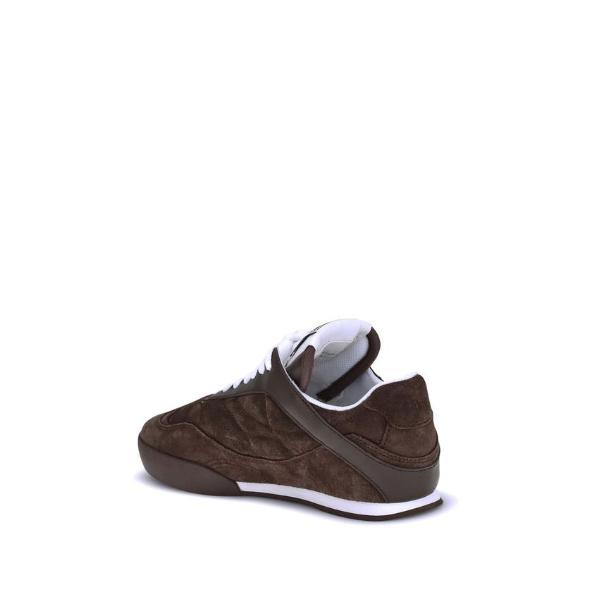 Brown Calf Leather Bos Taurus Low Top SneakersThe Kick Suede Sneakers by Chloé combine style and comfort. They feature a round toe and a paneled design that creates a dynamic visual effect. Suede details add a refined texture, while the front lace-up clos