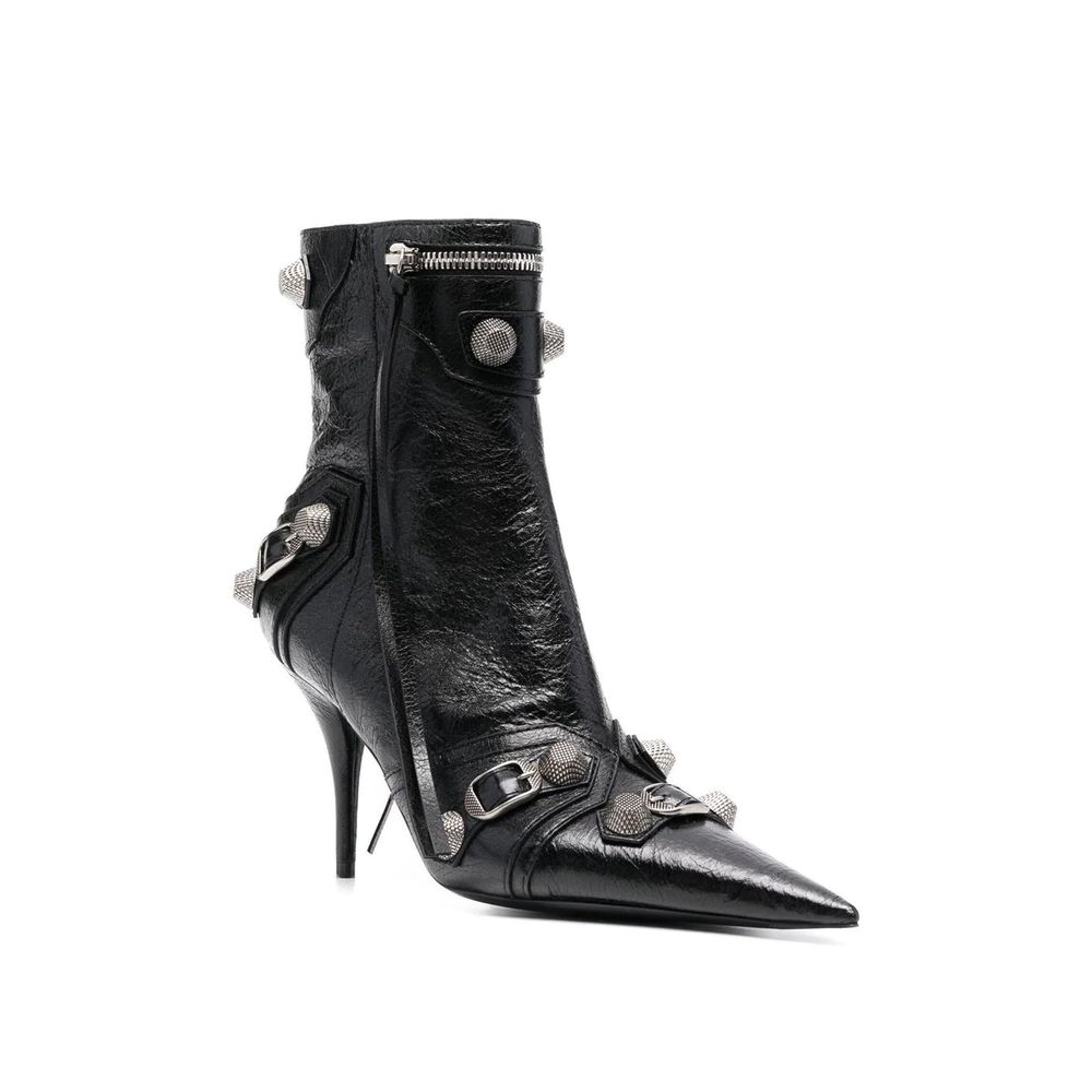 Black Lamb Leather High Heel BootsDescription: – Composition: 100% Lamb Leather – Inner: 100% Leather – Insole: 100% Leather – Sole: 100% Leather – Pointed toe – Zip fastening – Heel 9 cm – Studs detail – Buckle strap patches – Made in Italy – Gender: WOM