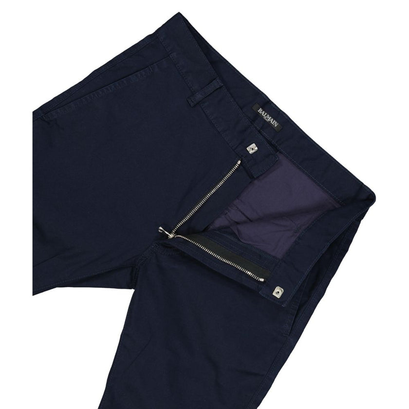 Blue Cotton Casual PantsDescription: – Composition: 95% Cotton 5% Polyurethane – Two side pockets – Belt loops – Zip fastening – Made in Italy – Gender: MEN –Blue Cotton Casual Pants${tagsBalmainAulae Blue Cotton Casual Pants BalmainAulae Blue Cotton Casu