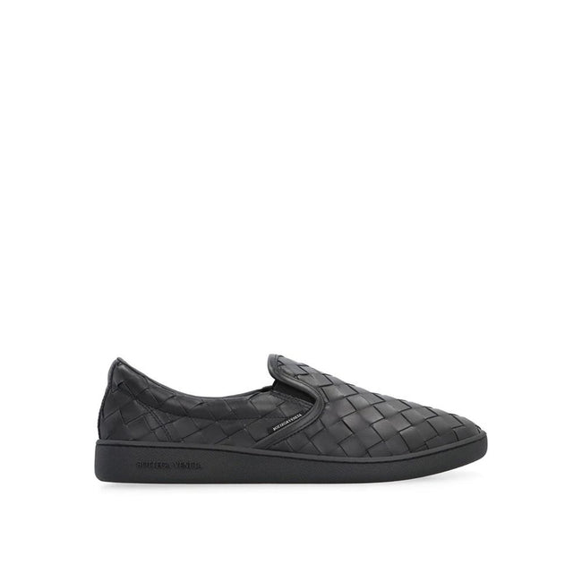 Black Calfskin SneakersDescription: – Composition: 100% calf leather – Inner: Leather – Insole: Leather – Sole: Rubber – Round toe – Branded insole – Elasticated side inserts – Slip-on design – Intrecciato weave – Made in Italy – Gender: MEN –Black Calfsk