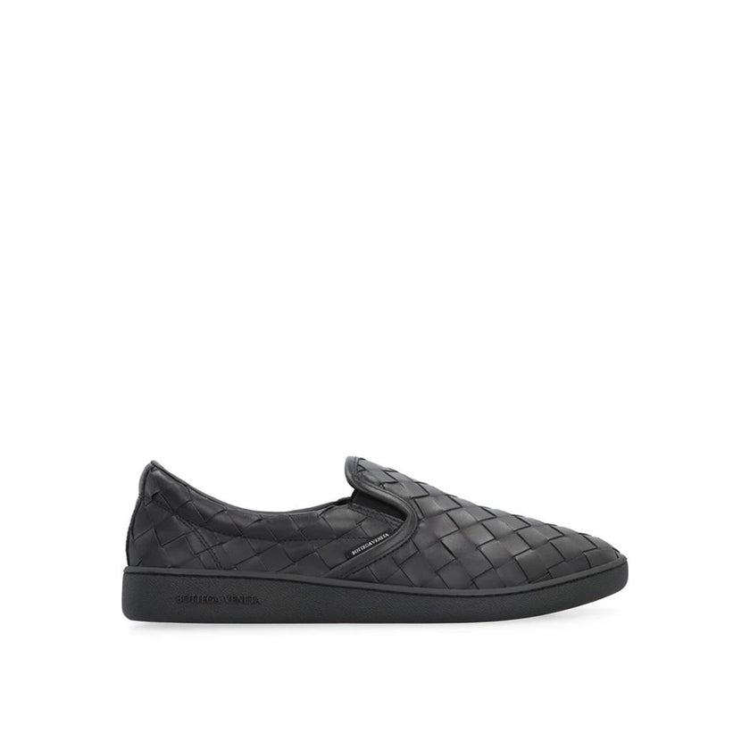 Black Calfskin SneakersDescription: – Composition: 100% calf leather – Inner: Leather – Insole: Leather – Sole: Rubber – Round toe – Branded insole – Elasticated side inserts – Slip-on design – Intrecciato weave – Made in Italy – Gender: MEN –Black Calfsk