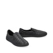 Black Calfskin SneakersDescription: – Composition: 100% calf leather – Inner: Leather – Insole: Leather – Sole: Rubber – Round toe – Branded insole – Elasticated side inserts – Slip-on design – Intrecciato weave – Made in Italy – Gender: MEN –Black Calfsk