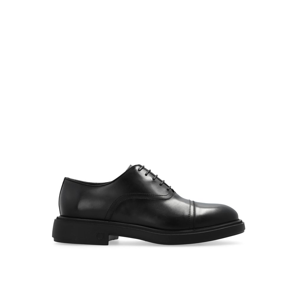 Black Calfskin Oxfords And DerbiesDescription: – Composition: 100% calf leather – Inner: Leather – Insole: Leather – Sole: Rubber – Round toe – Branded insole – Front lace-up closure – Made in Italy – Gender: MEN – Size & Fit: Heel height: 4,5cm Sole Heig