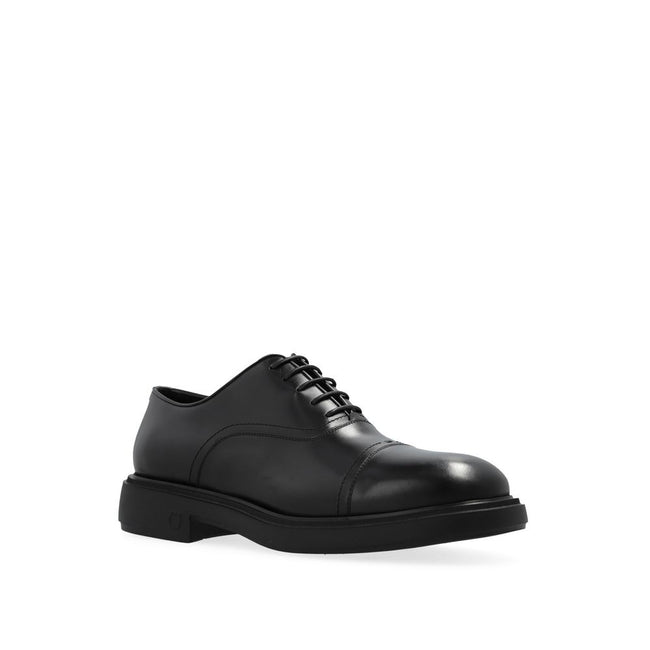 Black Calfskin Oxfords And DerbiesDescription: – Composition: 100% calf leather – Inner: Leather – Insole: Leather – Sole: Rubber – Round toe – Branded insole – Front lace-up closure – Made in Italy – Gender: MEN – Size & Fit: Heel height: 4,5cm Sole Heig