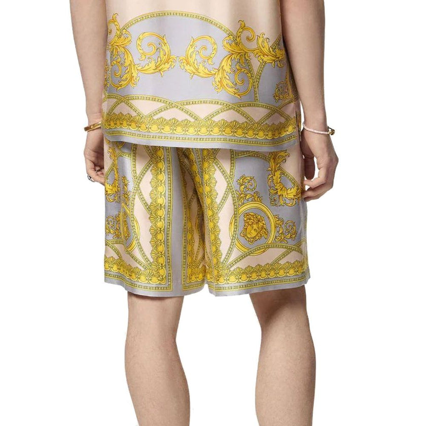 Gray Silk Short And Mini ShortsDescription: – Composition: 100% Silk – Elasticated waist – Hand wash – Side slant pockets – Back welt pockets – La Coupe des Dieux print with all-over classic and Baroque motifs – Made in Italy – Gender: MEN – Size & Fit: R
