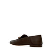 Brown Calfskin Slip-On LoafersDescription: – Composition: 100% calf leather – Inner: Leather – Insole: Leather – Sole: Leather – Branded insole – Slip-on design – Sole Height at the highest point: 1,5cm – Embossed to mimic crocodile skin – Decorative gold