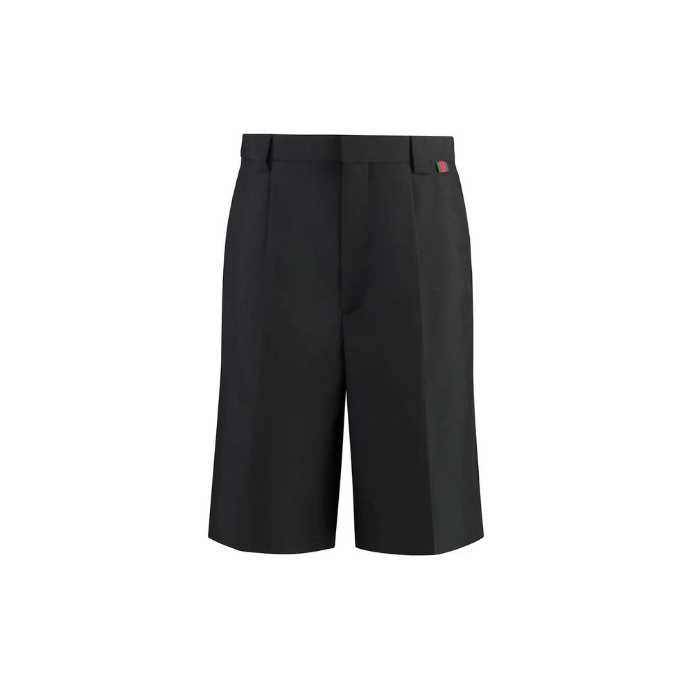 Black Polyester Bermuda ShortsDescription: – Composition: 55% Polyester 45% Wool – Two side pockets – Dry clean – Belt loops – Zip and hook & eye closure – Two back welt pockets – Distinctive green-red-green web detail – Made in Italy – Gender: MEN – Size