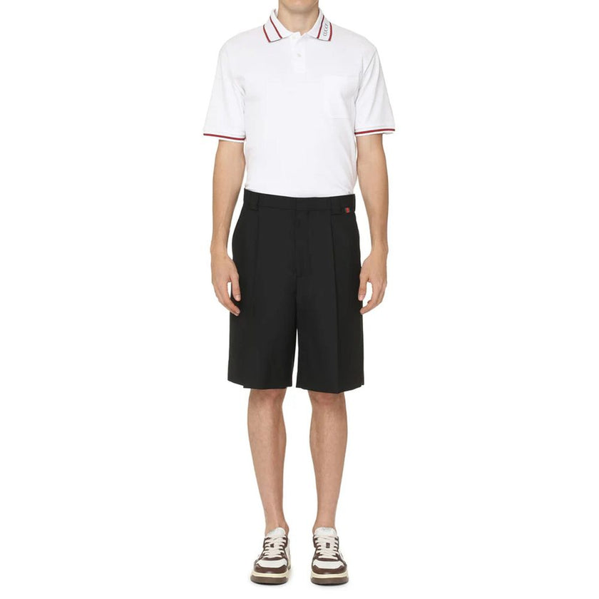 Black Polyester Bermuda ShortsDescription: – Composition: 55% Polyester 45% Wool – Two side pockets – Dry clean – Belt loops – Zip and hook & eye closure – Two back welt pockets – Distinctive green-red-green web detail – Made in Italy – Gender: MEN – Size
