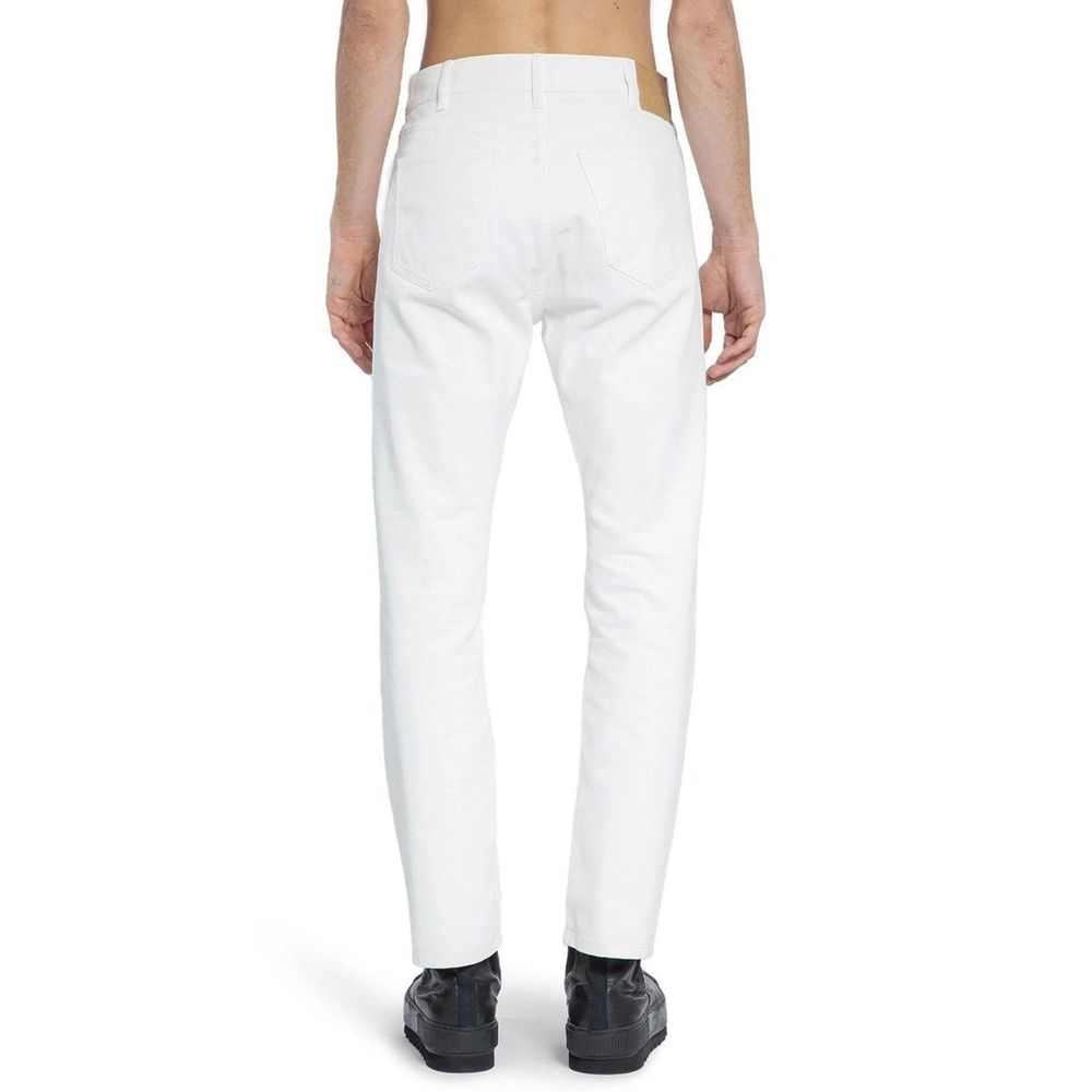 White Cotton Straight-Leg JeansDescription: – Composition: 100% Cotton – Belt loops – Five pockets – Button and zip closure – Straight legs – Machine wash (delicate) – Mid-rise – Made in Italy – Gender: MEN – Size & Fit: Classic fit.White Cotton Straight-