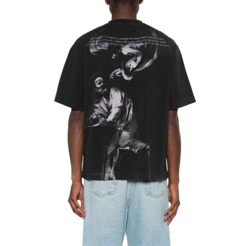 Black Cotton T-ShirtDescription: – Composition: 100% Cotton – Ribbed trims – Short sleeve – Dropped shoulders – Straight hem – Machine wash (delicate) – Boxy silhouette – Mock neck – Graffiti-style OFF logo print on the chest – Glossy graphics on the back