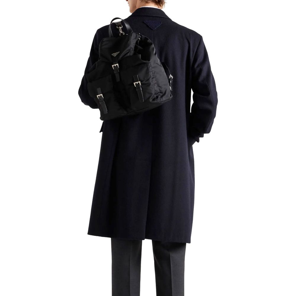 Wool CoatDescription: – Composition: 100% Wool – Long sleeves – Fully lined – One back vent – Straight hem – Single-breasted – Specialist wash – Two side flap pockets – Classic reverse – Back triangle logo detail – Made in Italy – Gender: MEN –Wool Coat${