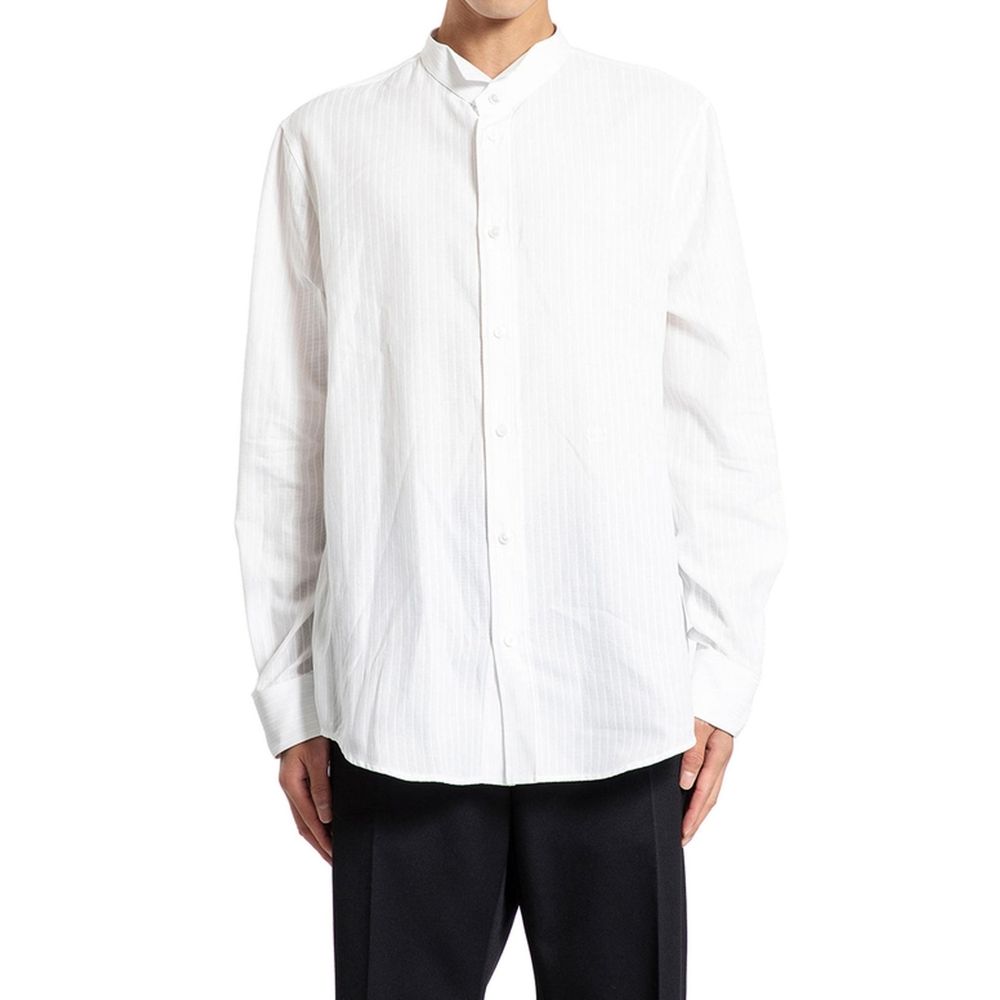 White Cotton Dress ShirtDescription: – Composition: 100% Cotton – Long sleeves – Front button closure – Embroidered logo detail – Regular fit – Mandarin collar – Made in Italy – Gender: MEN –White Cotton Dress Shirt${tagsCelineAulae Céline Cotton Shirt Ce