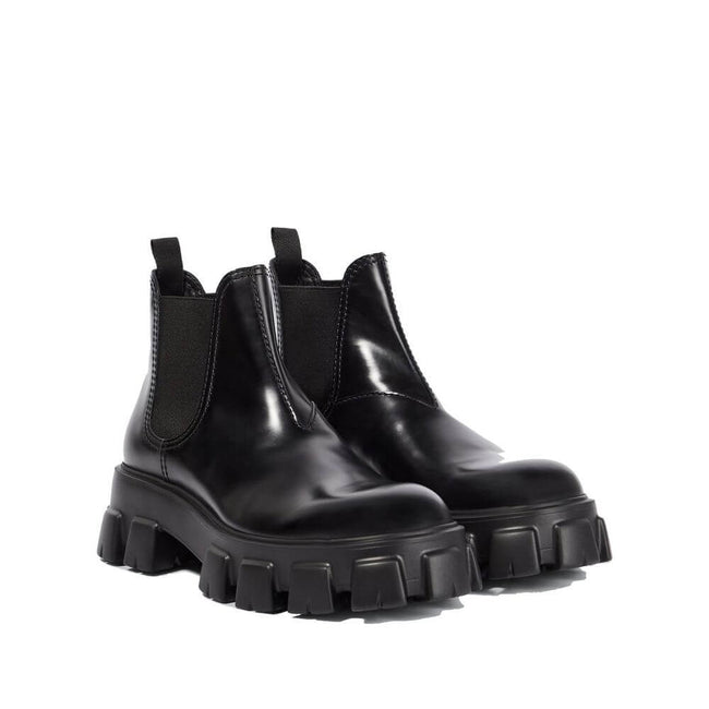 Black Calfskin Chelsea BootsDescription: – Composition: 100% calf leather – Inner: Leather – Insole: Leather – Sole: Rubber – Round toe – Slip-on design – Side elastic inserts – Made in Italy – Gender: MEN –Black Calfskin Chelsea Boots${tagsPradaAulae Bla