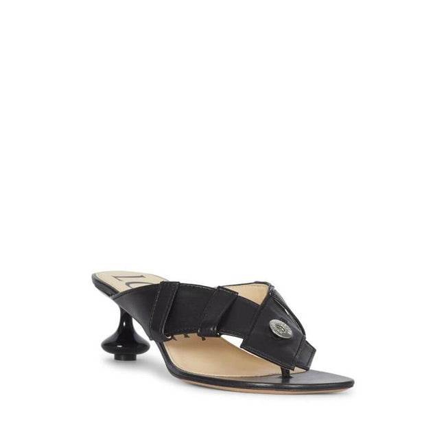 Black Lamb Leather Strap-On SandalsDescription: – Composition: 100% Lamb Leather – Inner: Leather – Insole: Leather – Sole: Leather – Round toe – Branded insole – Heel 4,5 cm – Lacquered signature Toy heel – Designed as a buttoned waistband – Made in Ital