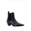 Snake-Effect Leather Chelsea BootsDescription: – Composition: 100% calf leather – Inner: Leather – Insole: Leather – Sole: Leather – pull tab at the rear – Pointed toe – Slip-on design – Heel 6 cm – Snake effect – Side elastic insert – Made in Italy – Gen