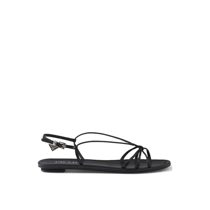 Black Calfskin SandalsDescription: – Composition: 100% calf leather – Inner: Leather – Insole: Leather – Sole: Leather – Open toe – Square toe – Adjustable buckle closure – Branded insole – Enamel triangle logo – Made in Italy – Gender: WOMEN –Black Calfs