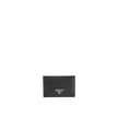 Black Calfskin CardholderDescription: – Composition: 100% calf leather – Lining: Leather – Width 1 cm – Triangle logo in enamelled metal – Length 10,5 – Height 7 cm – Made in Turkey – Gender: WOMEN –Black Calfskin Cardholder${tagsPradaAulae Black Calfskin
