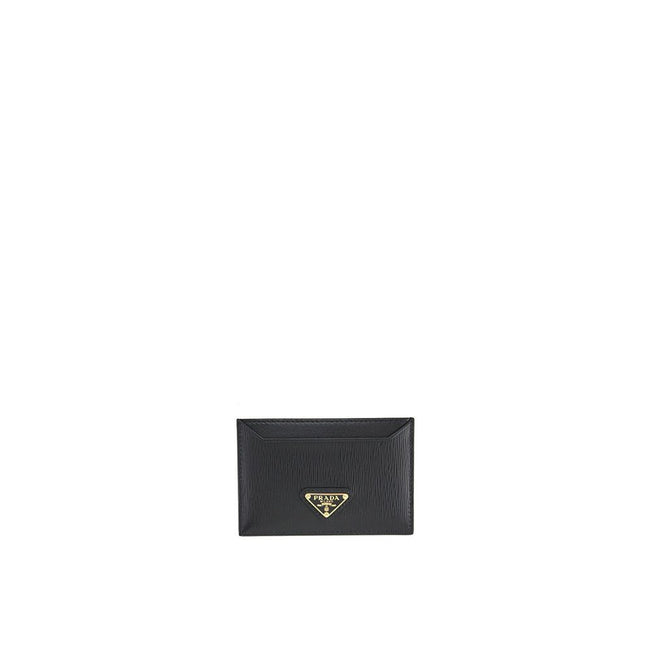 Black Calfskin CardholderDescription: – Composition: 100% calf leather – Lining: Leather – Width 1 cm – Triangle logo in enamelled metal – Length 10,5 – Height 7 cm – Made in Turkey – Gender: WOMEN –Black Calfskin Cardholder${tagsPradaAulae Black Calfskin