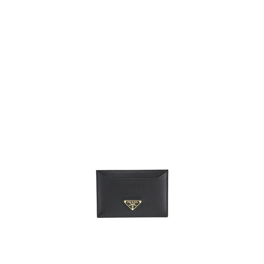 Black Calfskin CardholderDescription: – Composition: 100% calf leather – Lining: Leather – Width 1 cm – Triangle logo in enamelled metal – Length 10,5 – Height 7 cm – Made in Turkey – Gender: WOMEN –Black Calfskin Cardholder${tagsPradaAulae Black Calfskin