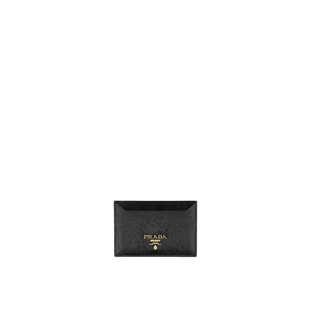 Black Calfskin WalletDescription: – Composition: 100% calf leather – Lining: Leather – Front logo lettering – Width 1 cm – Length 10,5 cm – Height 7 cm – Made in Turkey – Gender: WOMEN –Black Calfskin Wallet${tagsPradaAulae Black Calfskin Wallet PradaAula