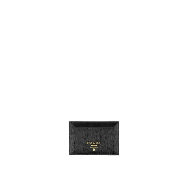 Black Calfskin WalletDescription: – Composition: 100% calf leather – Lining: Leather – Front logo lettering – Width 1 cm – Length 10,5 cm – Height 7 cm – Made in Turkey – Gender: WOMEN –Black Calfskin Wallet${tagsPradaAulae Black Calfskin Wallet PradaAula